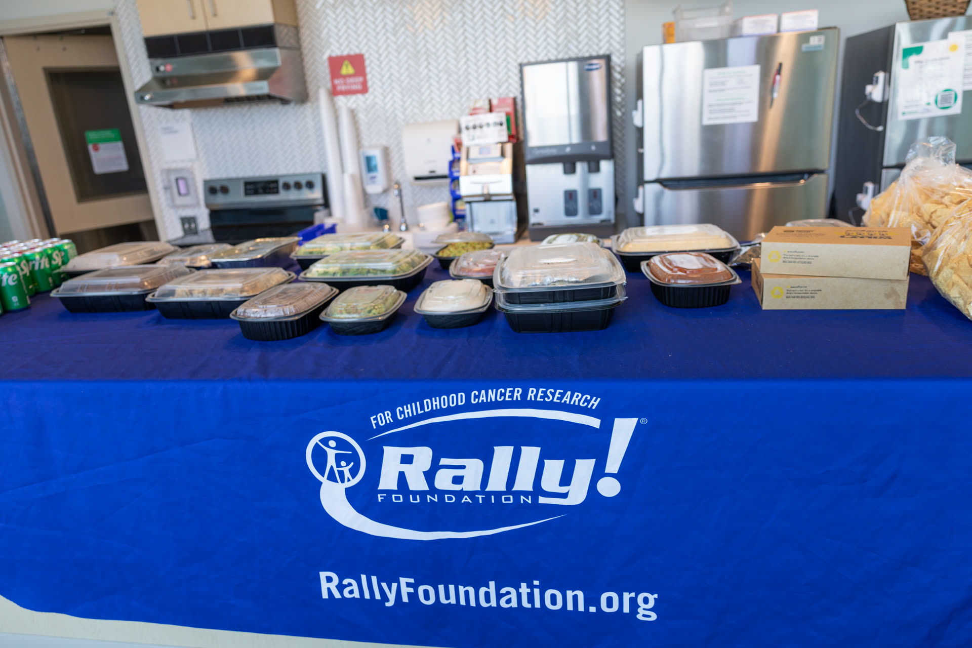 Full taco spread on a Rally Foundation branded table at Arthur M. Blank Children's Hospital